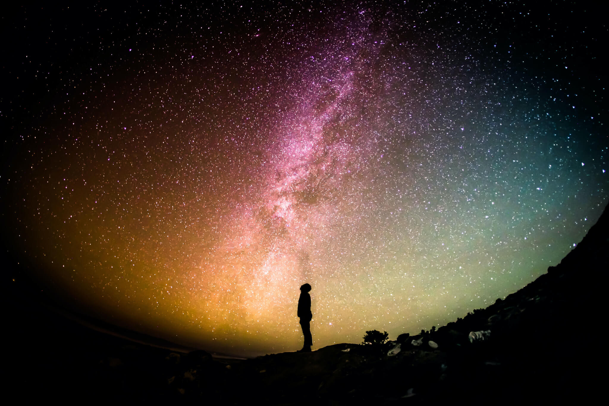 Man looking up at milky way